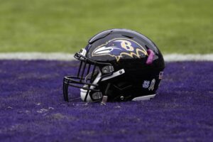 Ravens-helmet-on-field-scaled.jpg