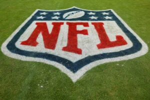 NFL-logo-on-field-in-grass-scaled.jpg
