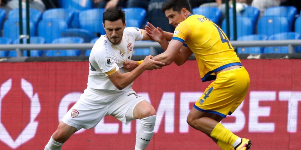 kazakhstan-s-marat-bystrov-in-action-with-north-macedonia-s-eljif-elmas.JPG
